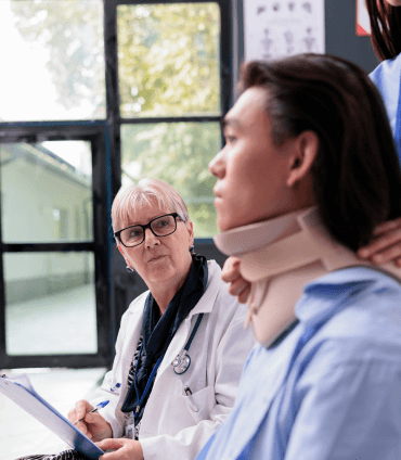 nurse-and-medic-helping-asian-patient-with-neck-br-2023-03-01-20-33-48-utc 1