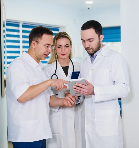 portrait-of-medical-team-standing-in-hospital-hall
