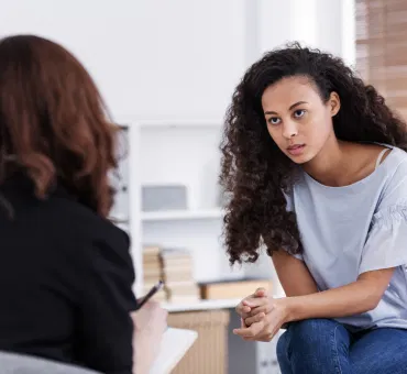 professional-counselor-and-woman-suffering-from-de-2021-08-27-14-49-08-utc 1