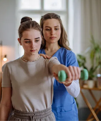 teenage-girl-doing-exercise-with-a-nurse-